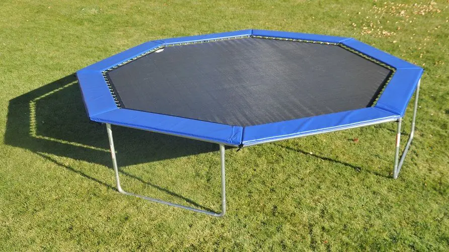 An octagon shaped blue american trampoline